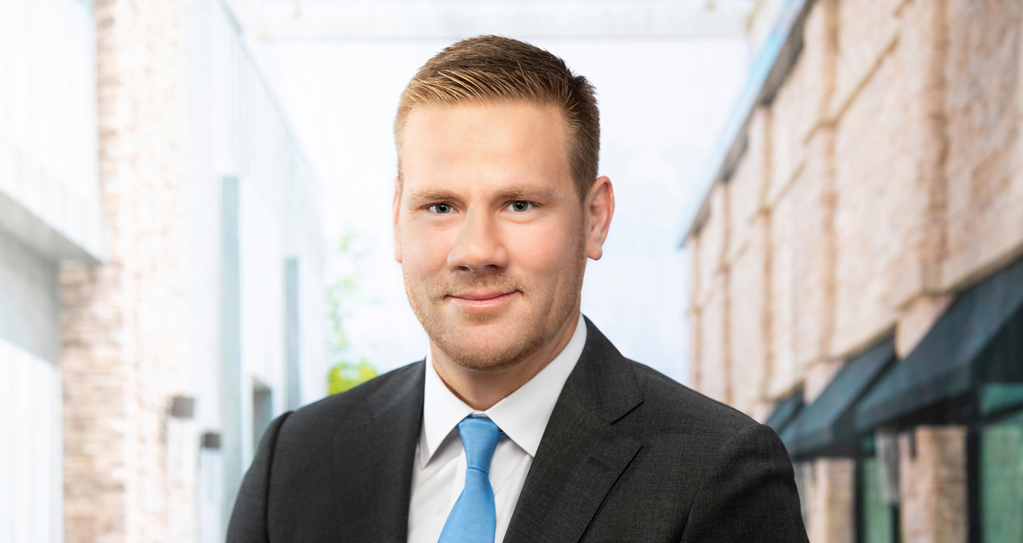 DJ Busch Transitions from Life as a Real Estate Researcher to the Corporate Suite